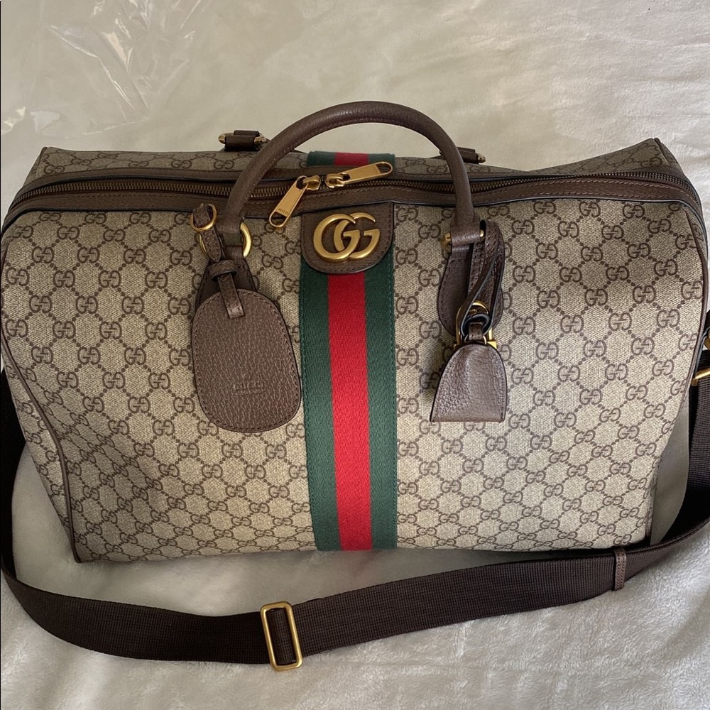 Ophidia GG medium carry-on duffle.